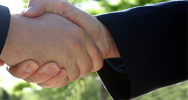 Shaking the hand of the Private Investigator Denver trusts